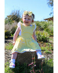 YELLOW FLUTTER PINNY - Toots Kids